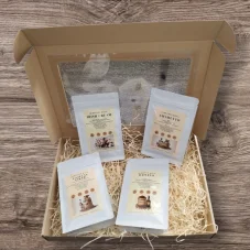 Darčeková sada ochutených káv Haniell 4×100 g – Irish Cream, Baileys, Amaretto a Vaječný likér vianočný darček pre milovníkov kávy