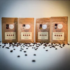 Darčeková sada kávy Haniell špeciál – Sladká hruška, Slaný karamel, Pistácie, Kokosové pralinky (4×100 g)